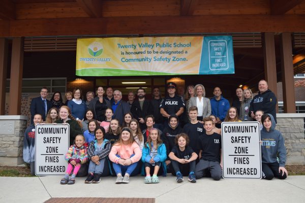 Governmental delegates pose with students from Twenty Valley PS