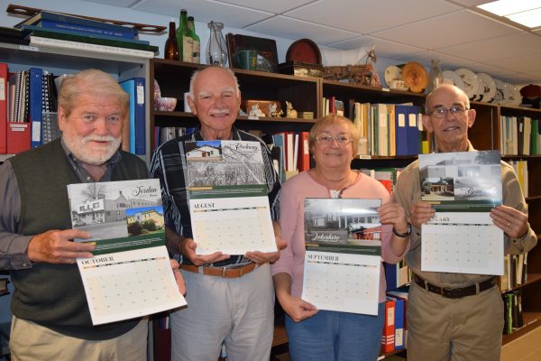Friends of Lincoln's History holding onto their calendar.
